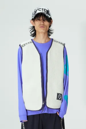 PENCHANT REVERSIBLE VEST