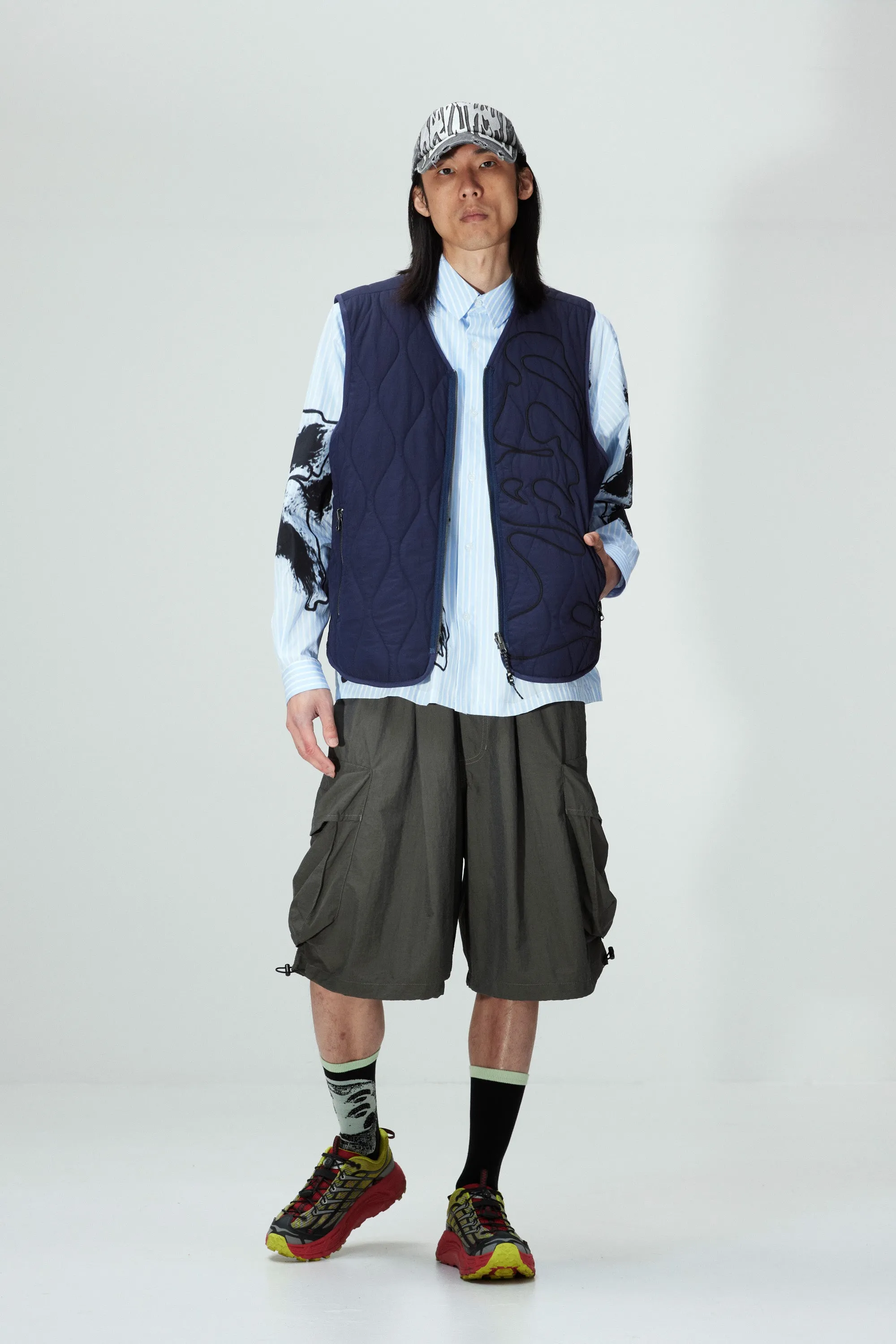 PENCHANT REVERSIBLE VEST