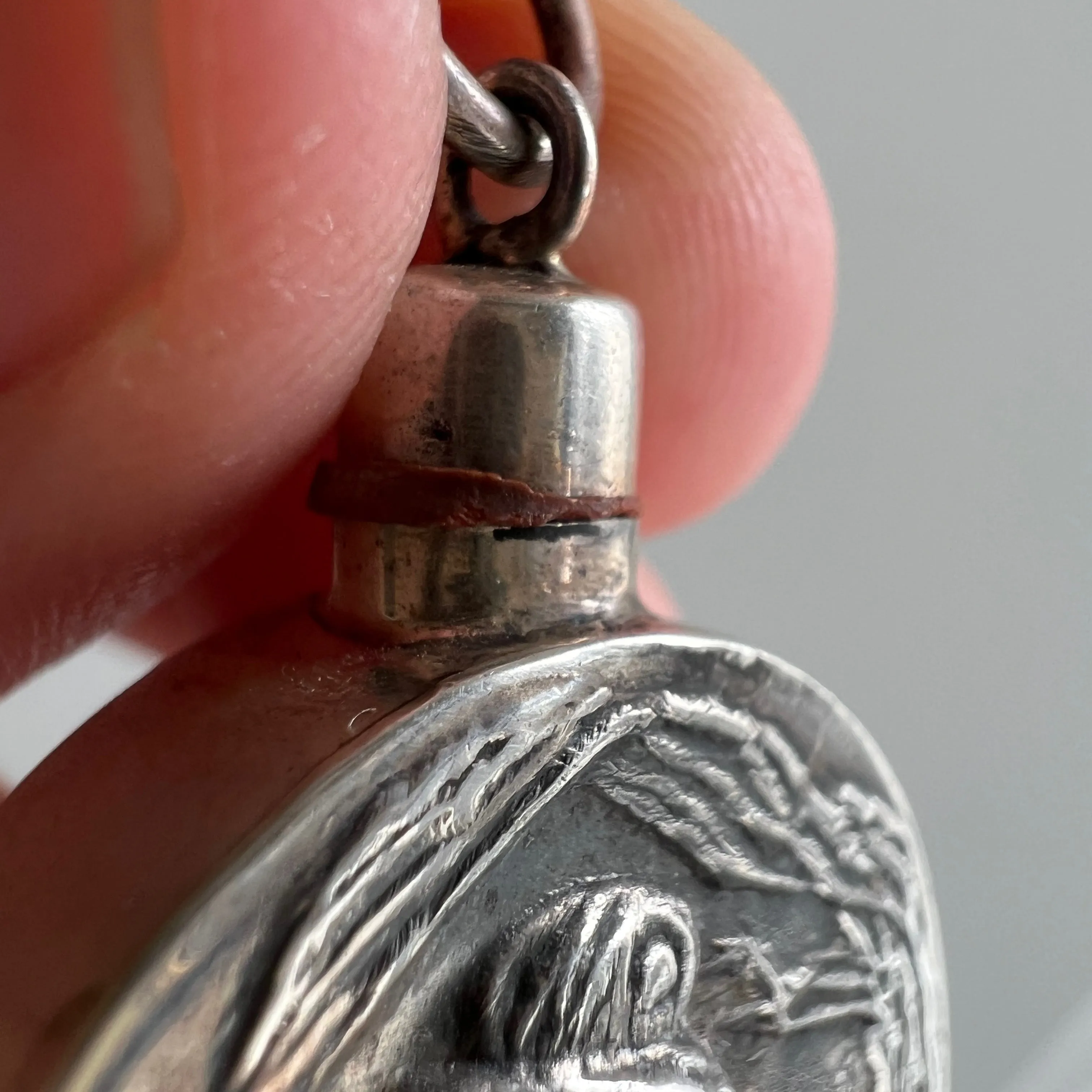 V I N T A G E // wind blown side eye / sterling silver art nouveau style perfume bottle / a pendant